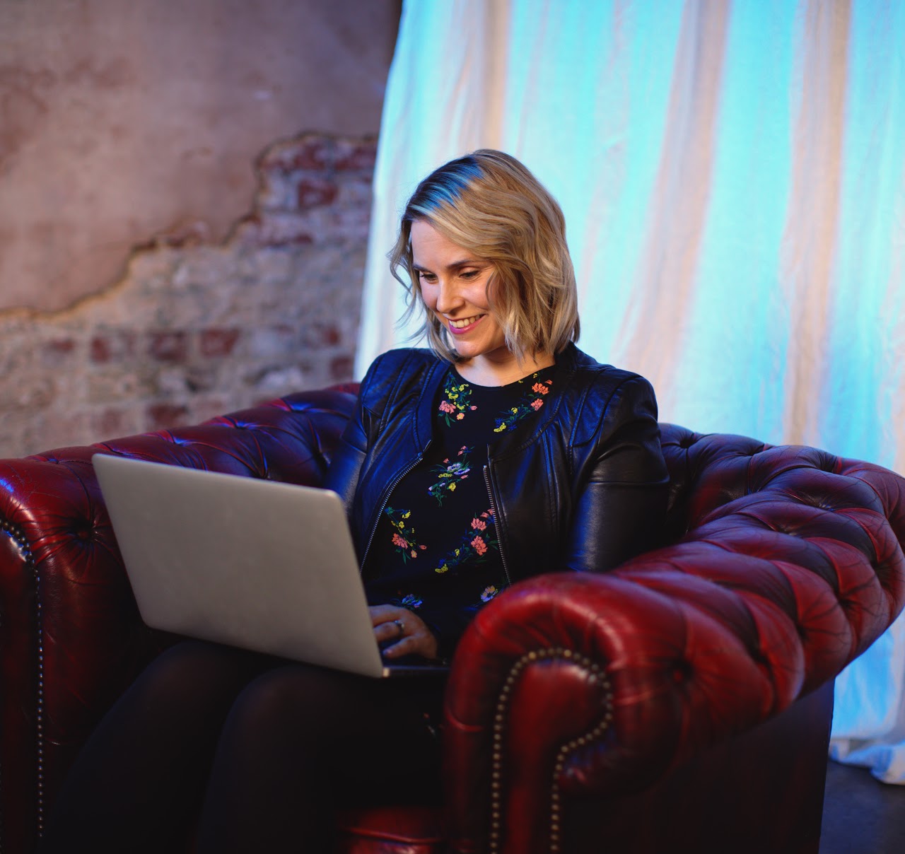 Natalie Nicholls   Rep working on laptop